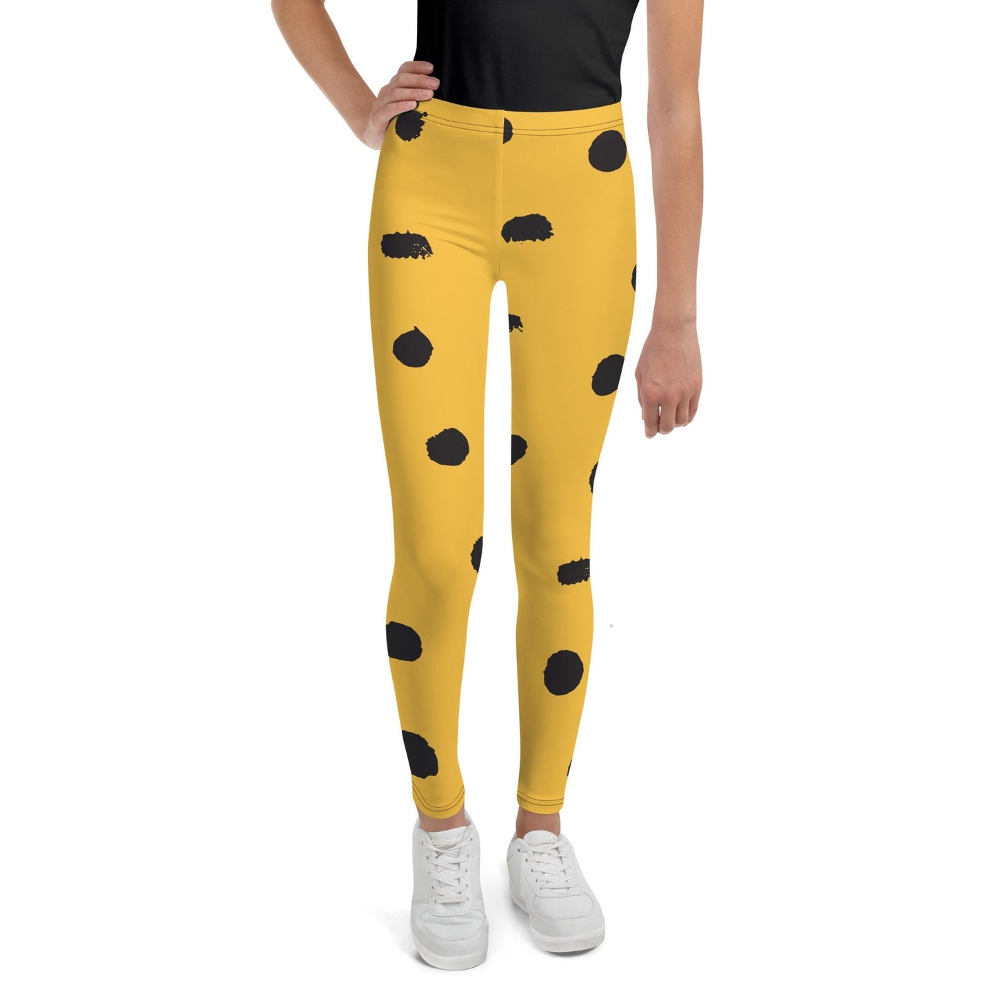 Legging fille ado - jaune et noir imprimé animal minimaliste – vue de face, taille haute et coupe près du corps
