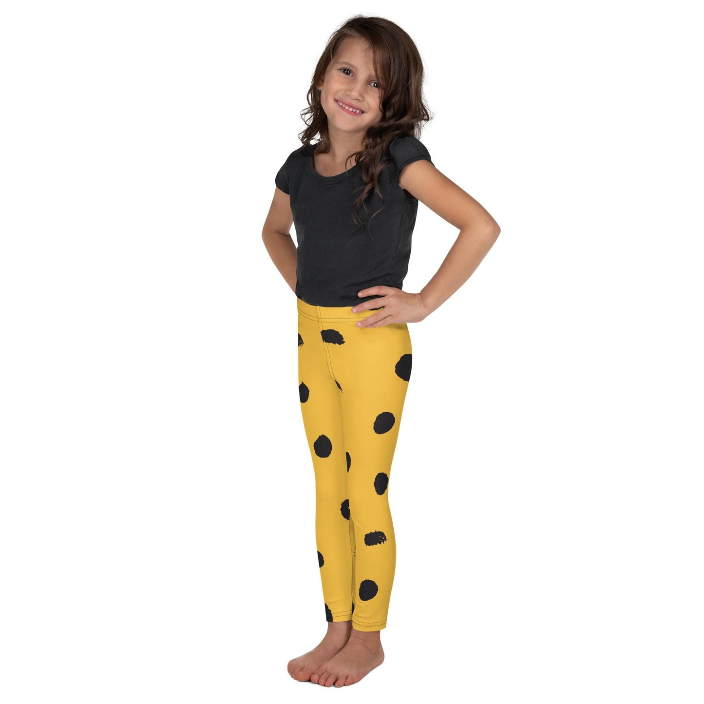 Leggings petite fille– vue de profil, confort et liberté de mouvement - jaune et noir - motif gymnaste danseuse