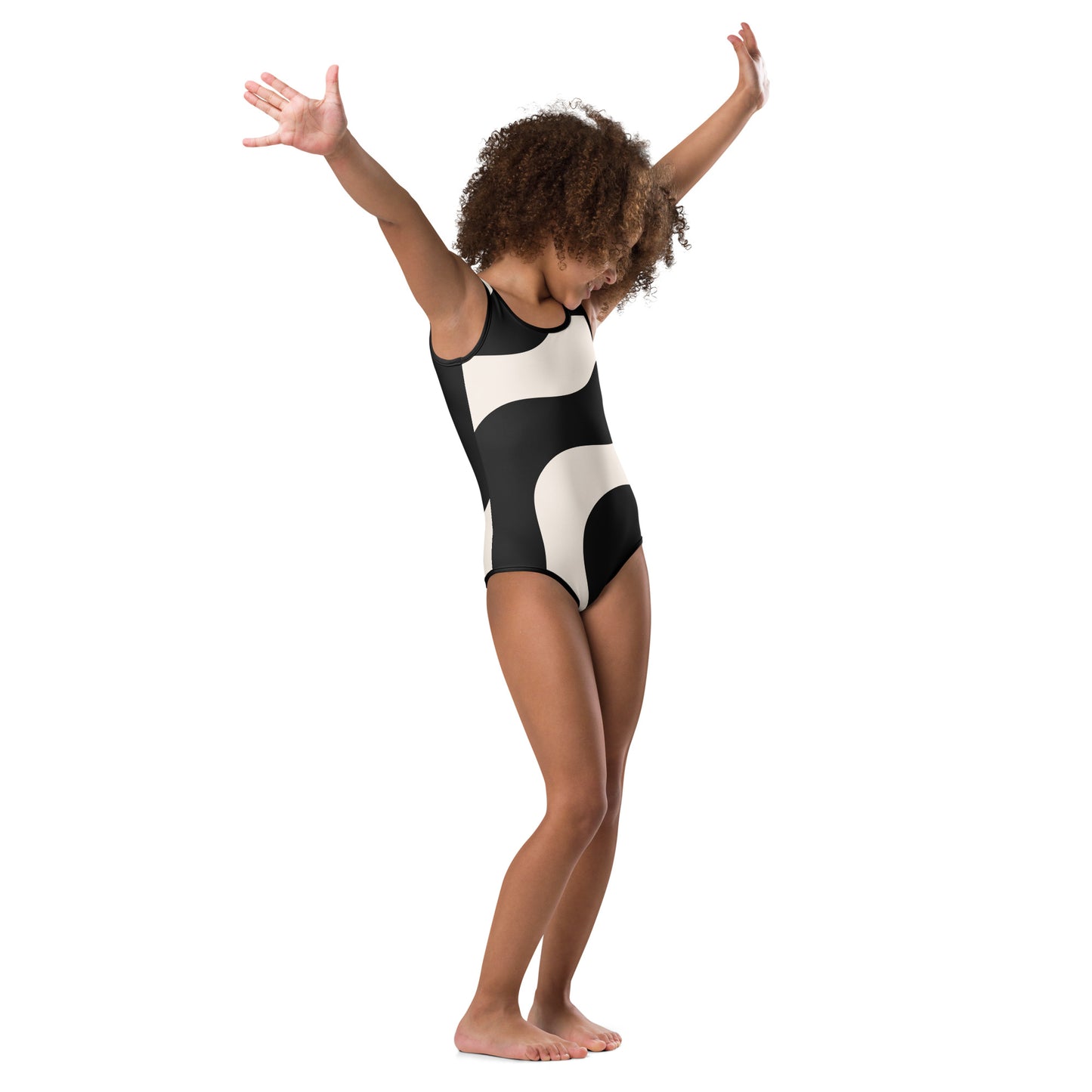 Maillot de bain enfant - beige et noir à ondulations, graphique, minimaliste – vue de profil, aisance en mouvement