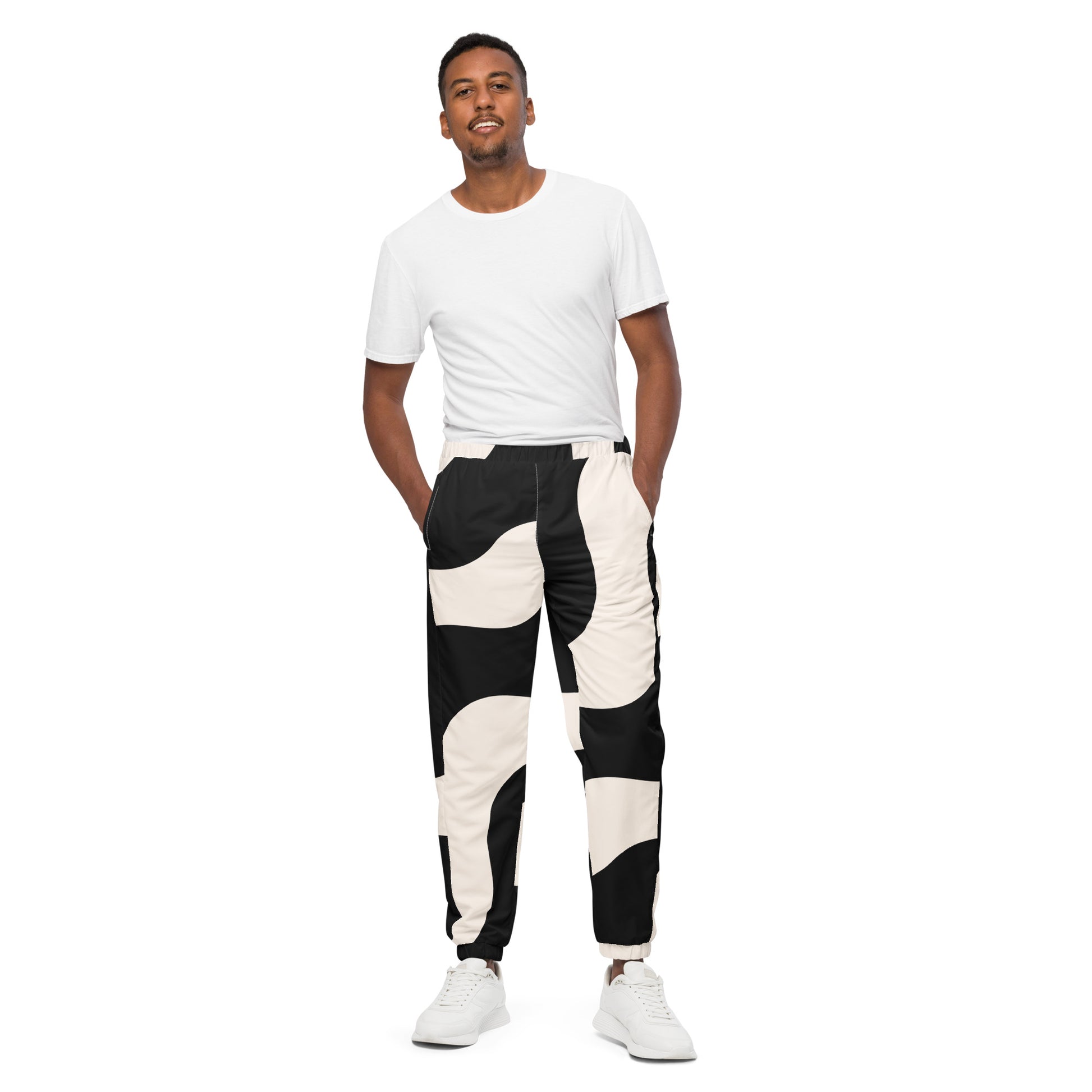 Pantalon de survêtement homme  – vue de face, coupe confortable - pantalon homme - beige et noir - imprimé graphique minimaliste