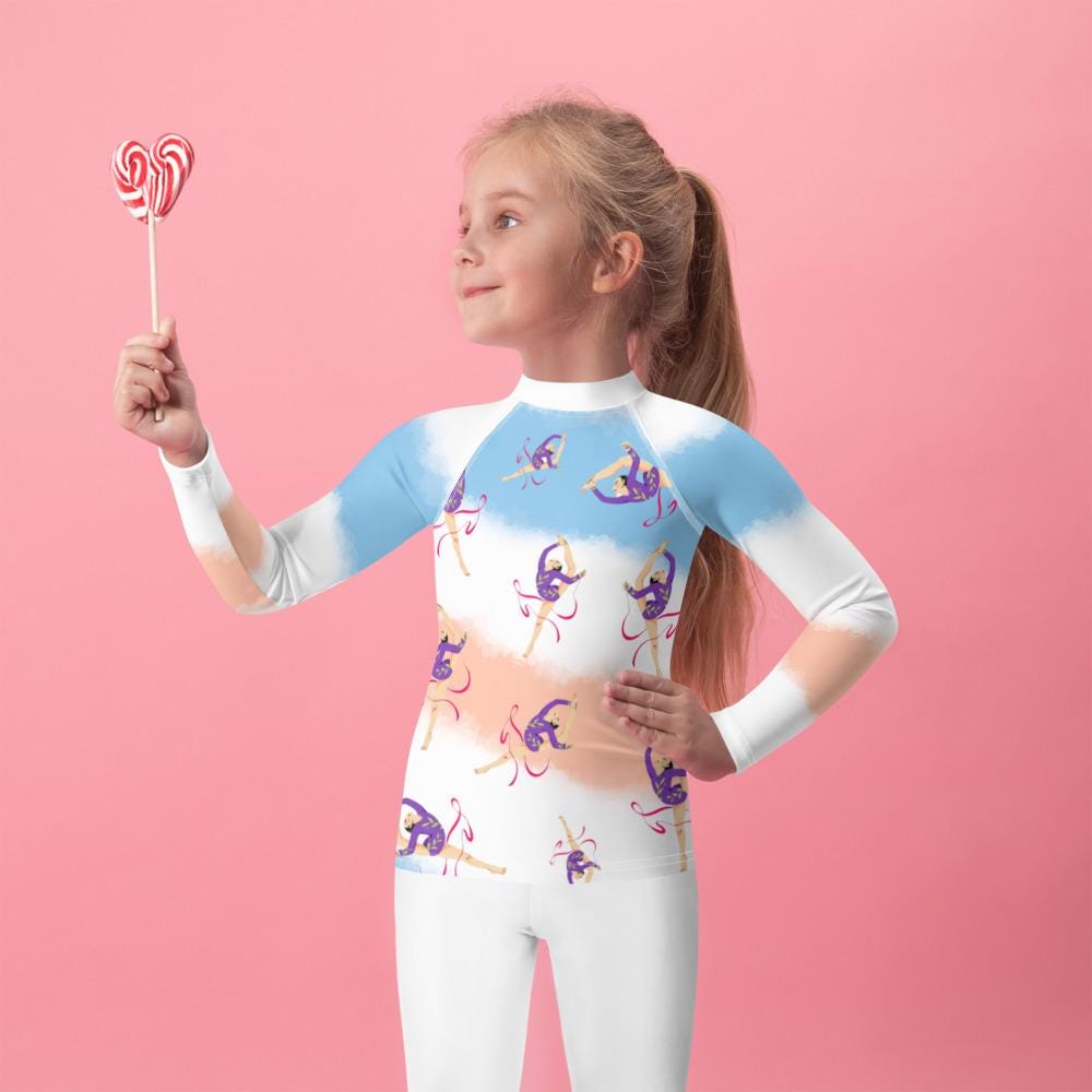 Rash guard petite fille – dégradé bleu blanc saumon - motif gymnaste danseuse - vue de face, compression légère