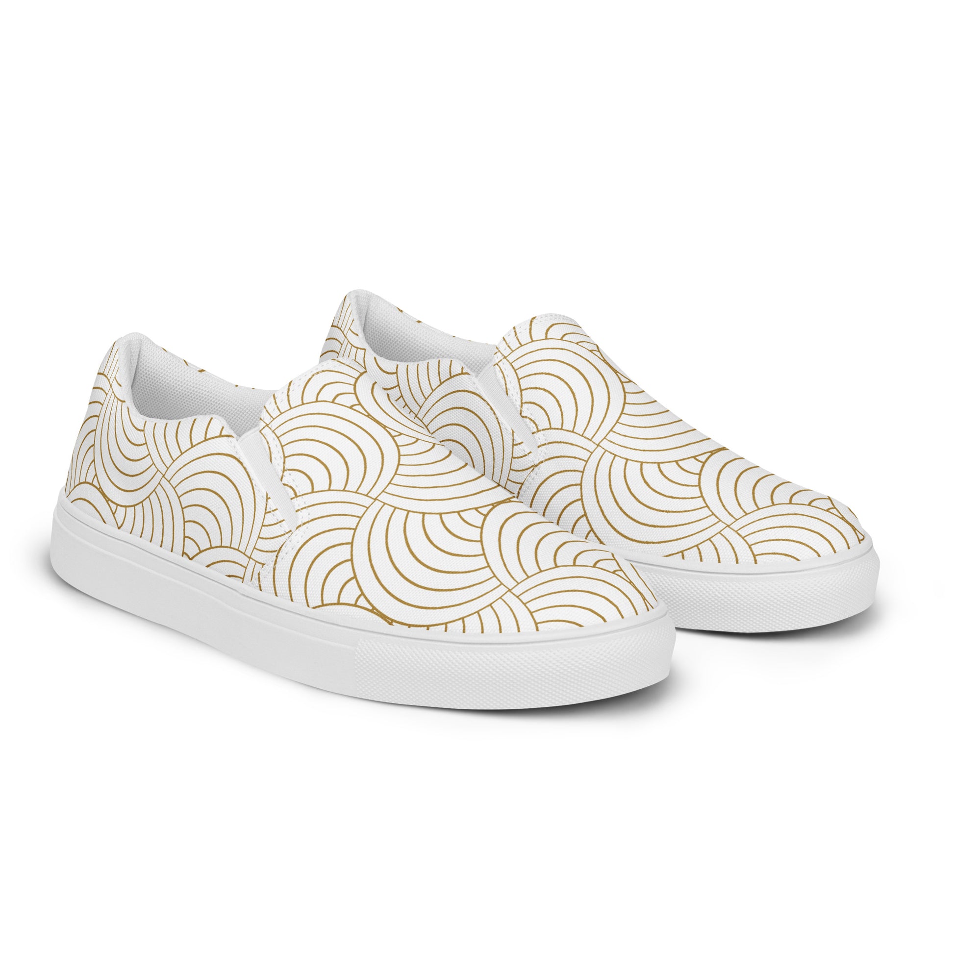 Gros plan matières et finitions, tennis slip-on blanc et or, style graphique