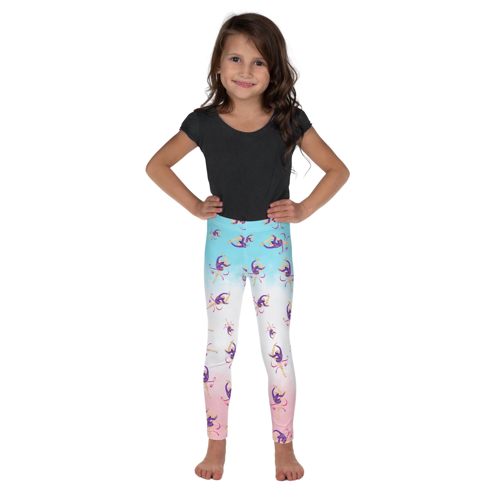 Leggings petite fille vue de face, tissu doux et extensible - bleu, blanc, rosé - motif gymnaste danseuse 