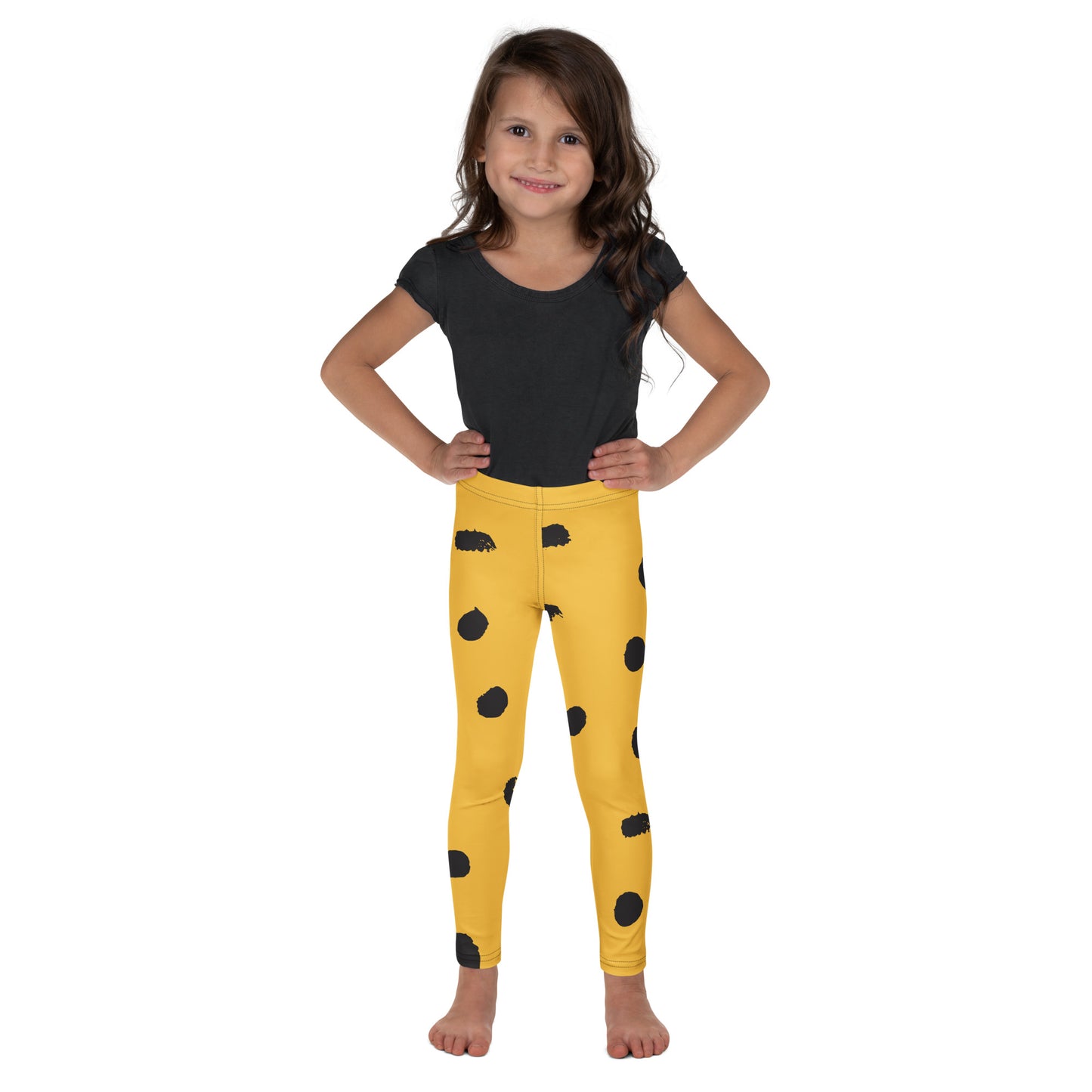 Leggings petite fille – vue de face, tissu doux et extensible - jaune et noir - motif gymnaste danseuse 